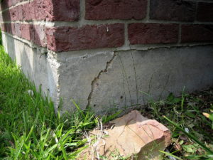 Foundation brick Basement flooding cracking Yard flooding