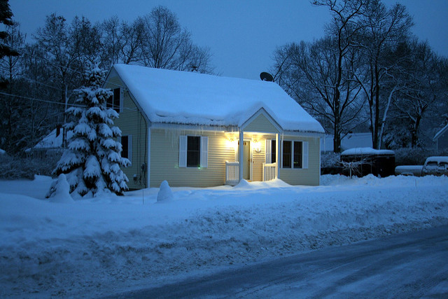 snowy house flooded basement flooded yard