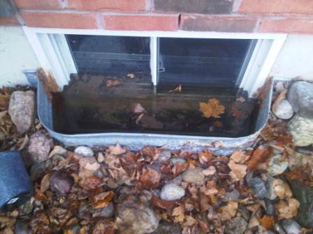 Flooded window well rocks window flooding flooded basement