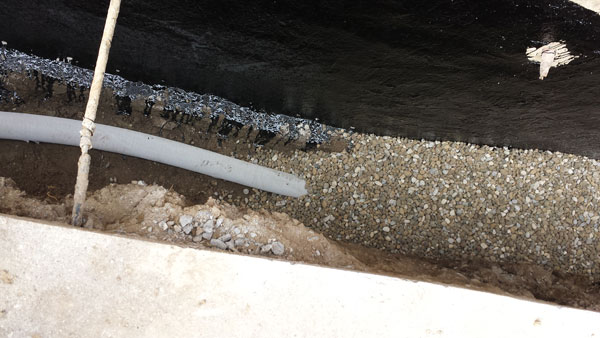 Water Proof | Ashworth Drainage Crushed stone backfill pipes in ground